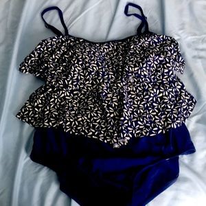 One piece bathing suit, size 16